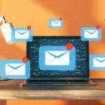 A mockup of a laptop with emails surrounding it.